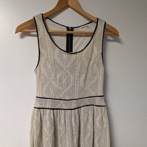 Monteau Los Angeles:  girls Medium fall/winter off white dress with black trim.